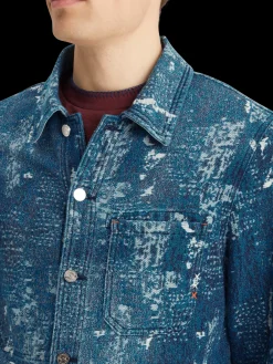 Indigo jacquard denim workwear jacket with wash effects