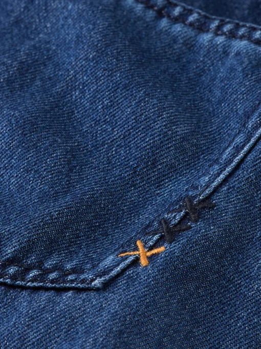 LIGHTWEIGHT DENIM JUMPSUIT IN DARK WASH WITH TONAL DETAILING