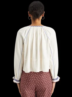 Top with embroidery details