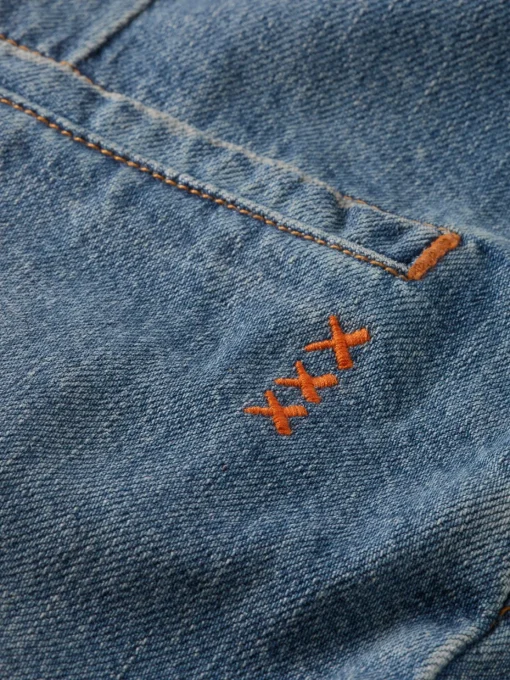 Washed denim workwear jumpsuit